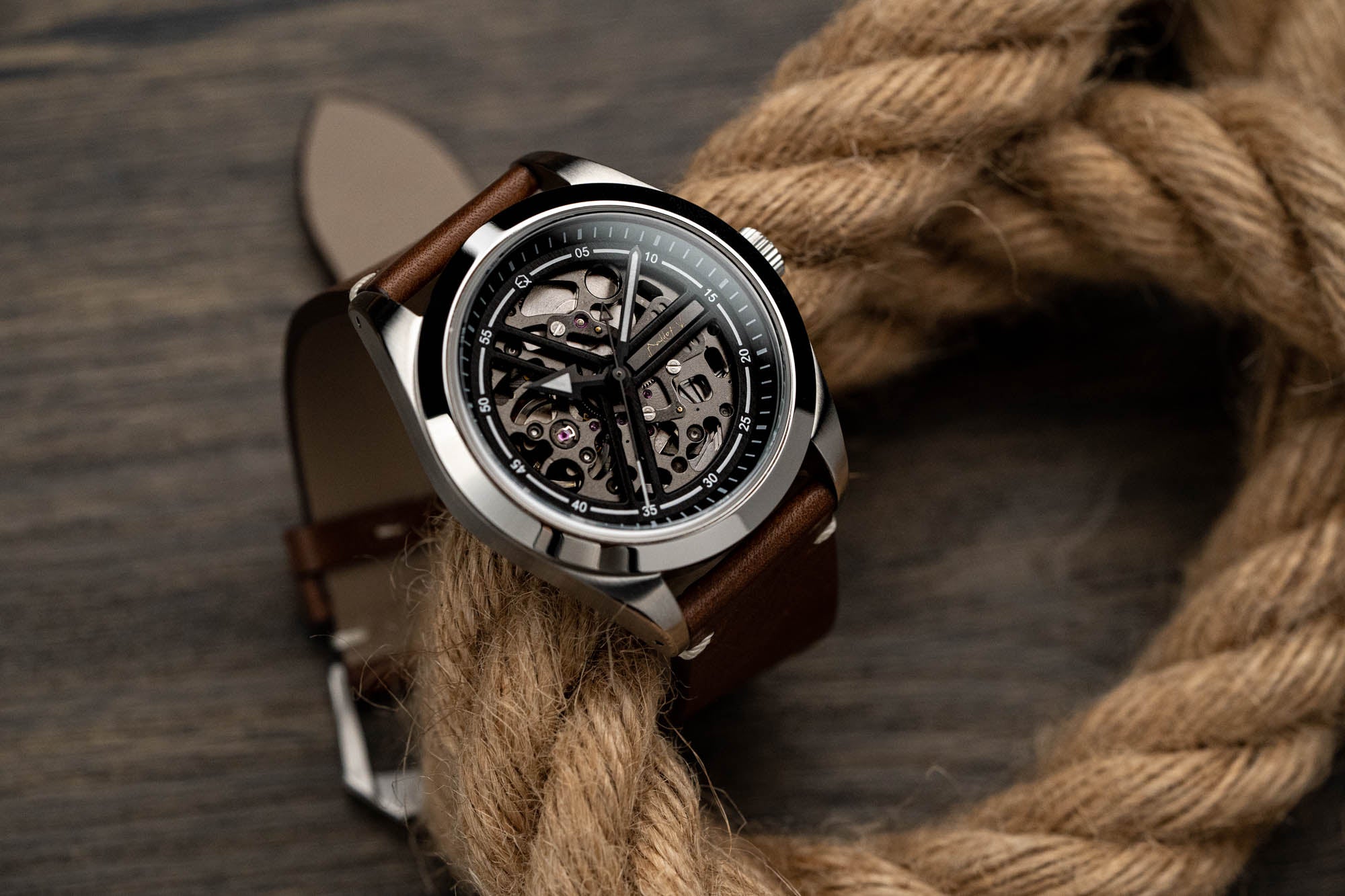 Skeleton "explorer" style sports watch. Custom made. Paired with vintage calf leather strap